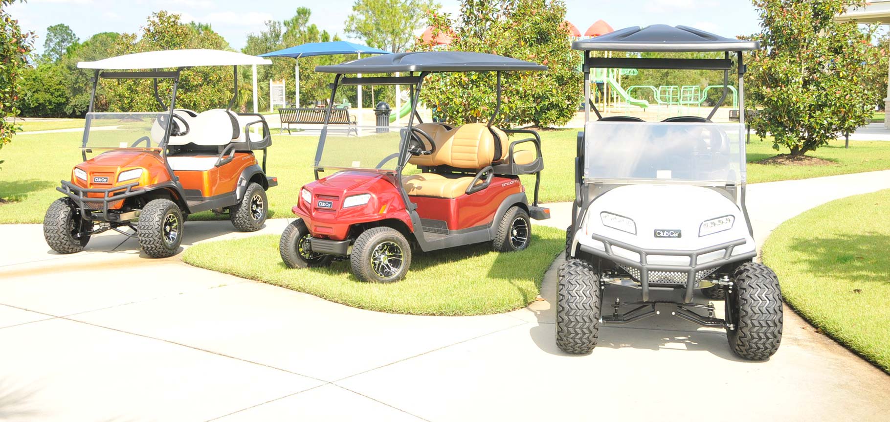 Line of 3 golf carts image