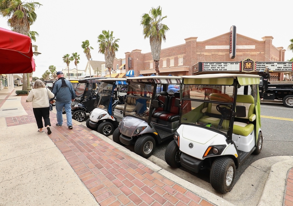 4 golf carts parked, buying a golf cart golf cart dealer north port fl
