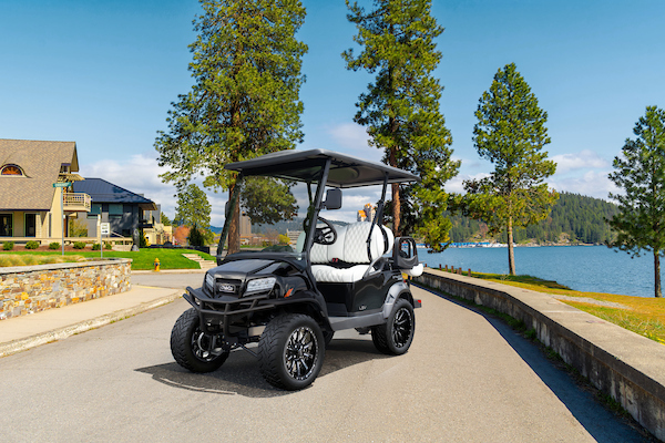 Club Car Golf Carts for Sale in Wellen Park. Onward golf cart on a paved path.